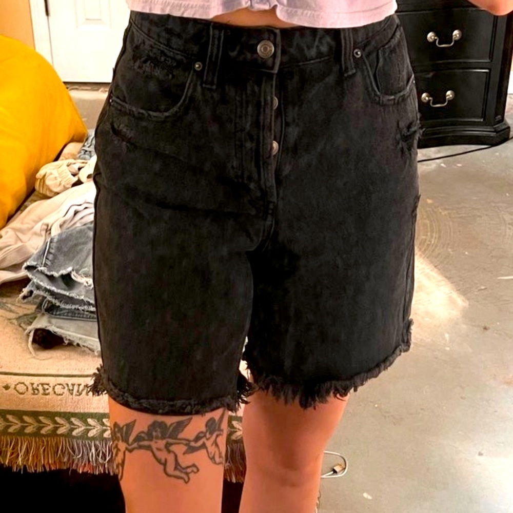 Black thigh length shorts
